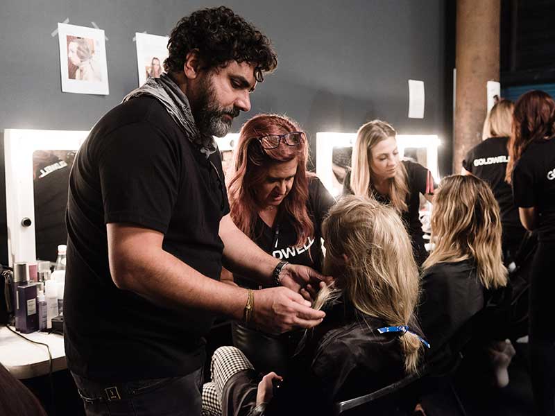 working hair backstage at Camilla Parade for Mercedes-Benz Fashion Week